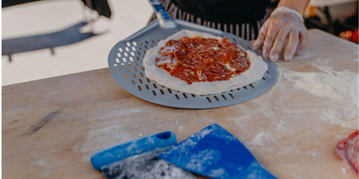 A Extensão do Braço do Pizzaiolo: O Guia Definitivo para Escolher a Pá de Pizza Profissional